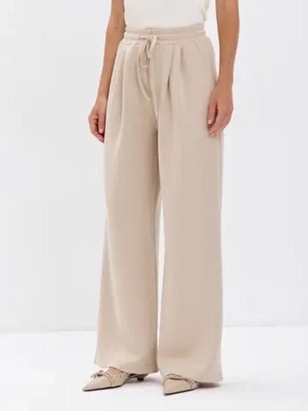 Широкие демисезонные брюки-палаццо со складками