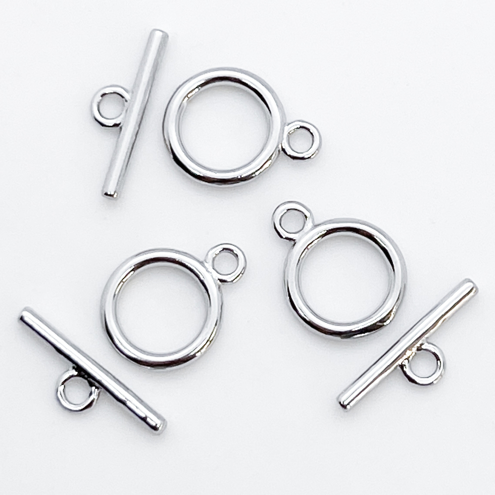 Замок-тоггл, цвет серебро, размер 11*9 мм, цена за 1 шт