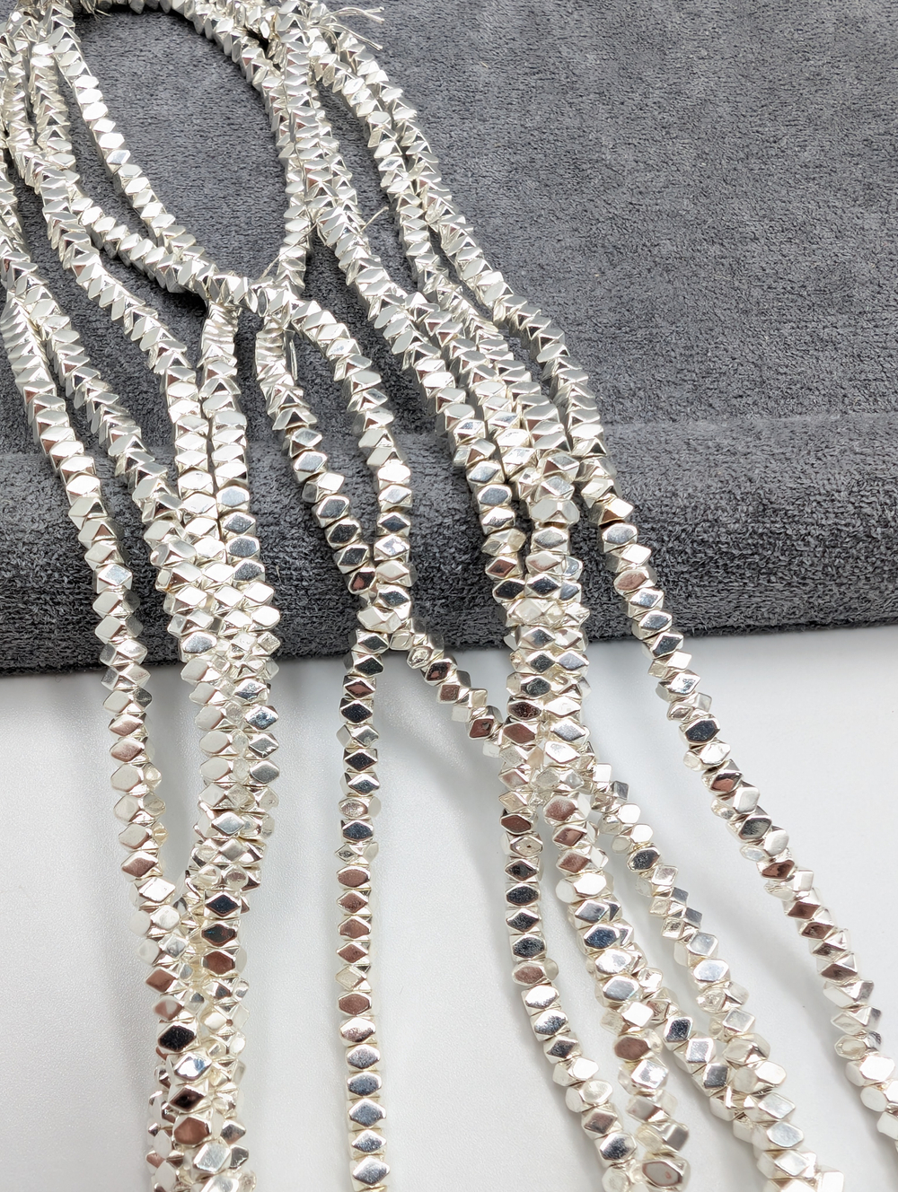 Гематит ромбики 3*2, светлое серебро