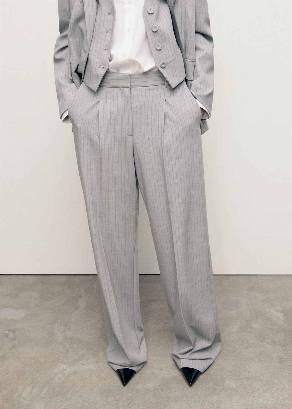 Костюмные брюки в узкую полоску