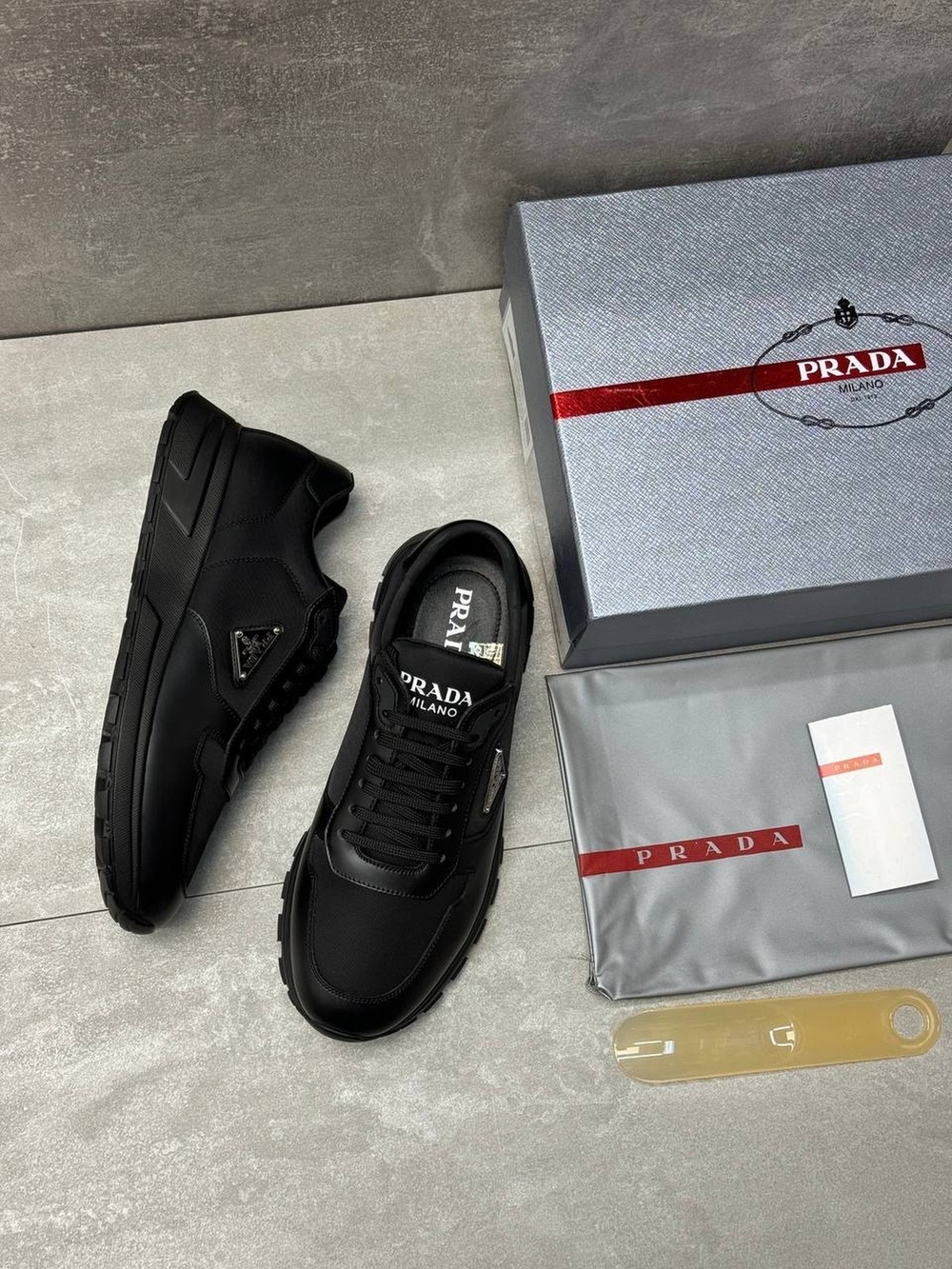 Кроссовки Prada
