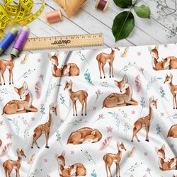 Ткань габардин оленята из мультиков на белом фоне с листвой