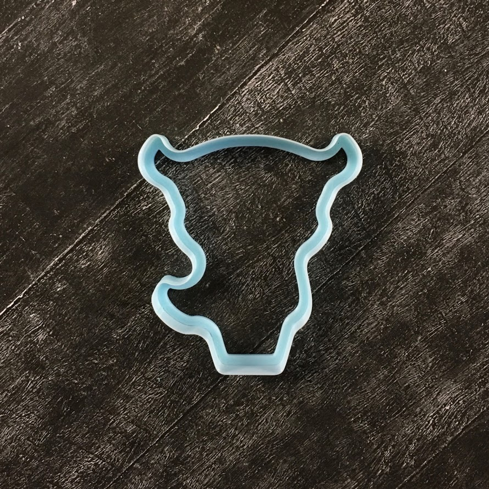 Бык №12 с колокольчиком на шее