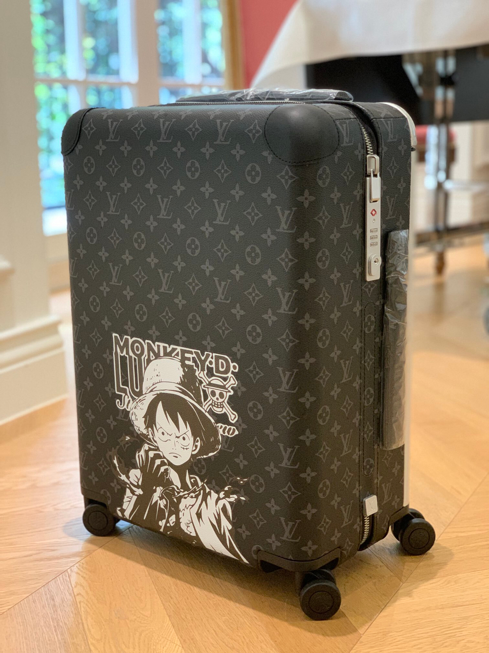 Louis Vuitton Horizon 55 Suitcase
