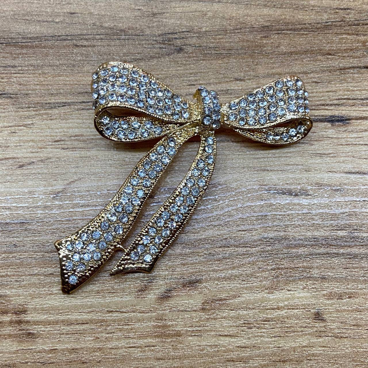 Бант с длинными завязками стразы металл золотистый 5,5 х 5,2 см