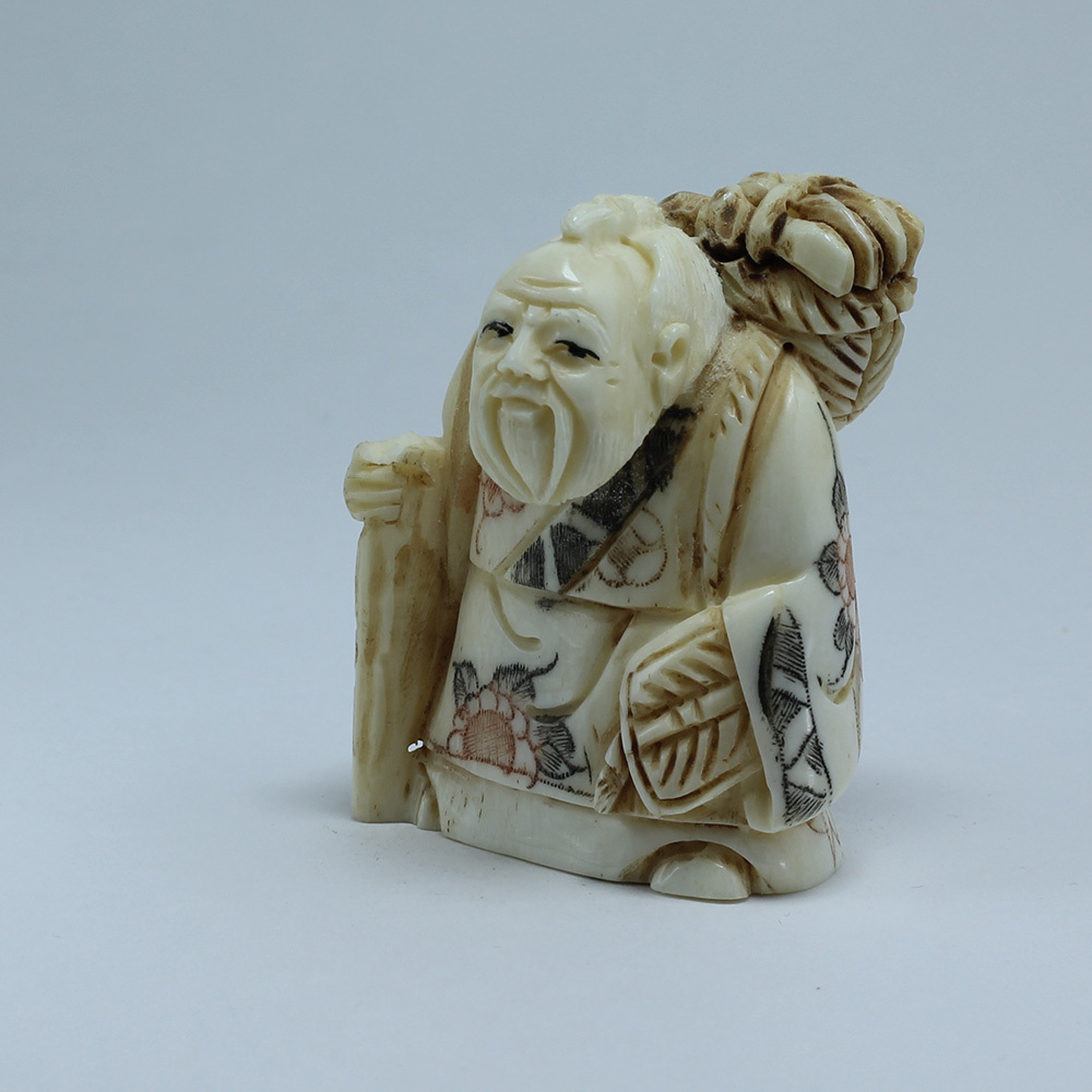 Эксклюзивная нэцкэ Монах с тростью, корзиной фруктов и веером