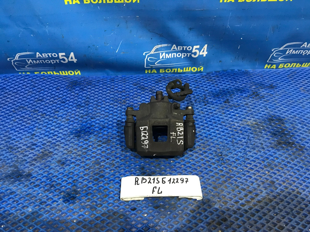 Суппорт тормозной передний левый SUZUKI AERIO 2001-2007