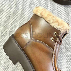 Женские лоферы Prada с мехом