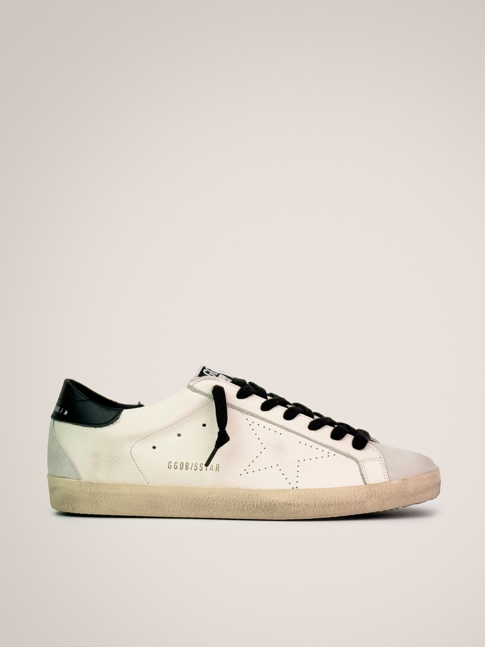 Men's Super Star with black heel tab and with perforated star