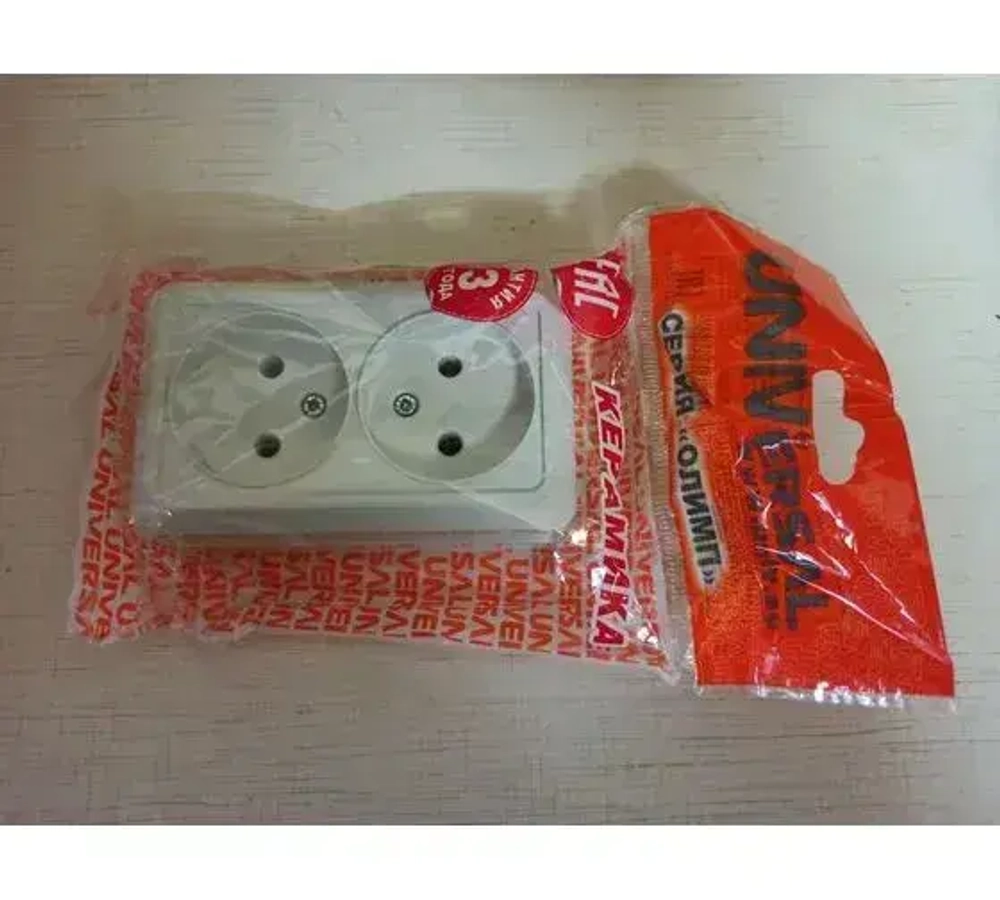 Розетка Двойная открытой установки Белая 2-ая без заземления UNIVersal "Олимп" О0102