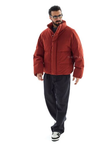 Короткий пуховик терракотового цвета