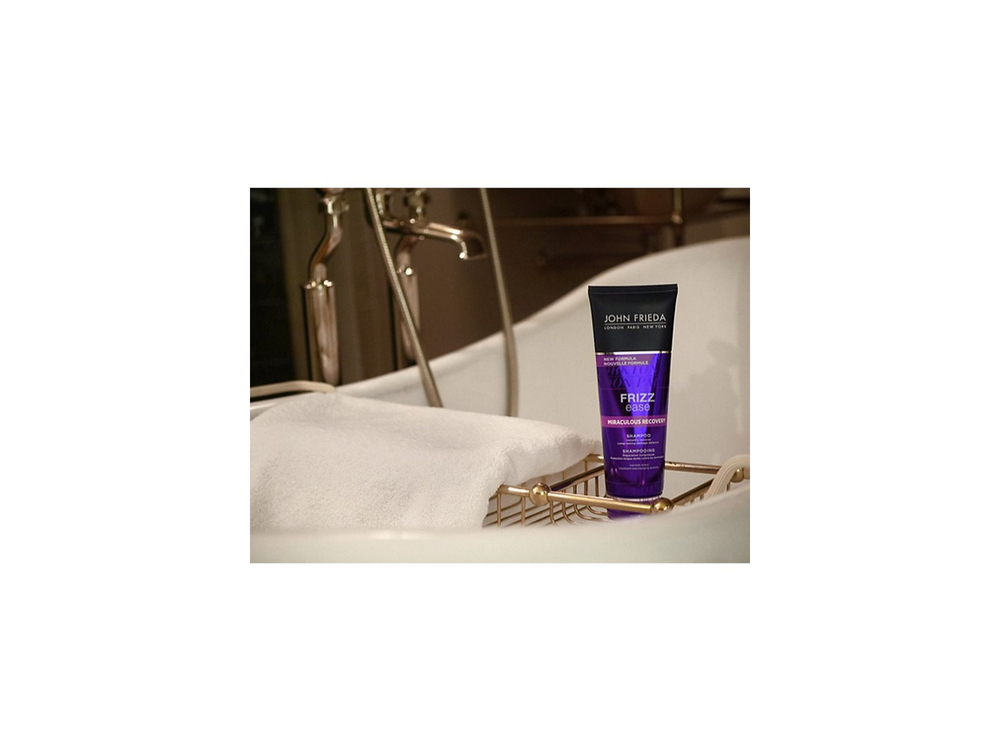 John Frieda Frizz Ease Miraculous Recovery - восстанавливающий шампунь для поврежденных волос /   250  ml  / GTIN 5037156210330