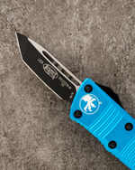Автоматический складной нож Microtech Mini Troodon Black Tanto 240-1BL (голубой) фронталка/выкидуха