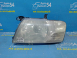 Фара передняя левая MITSUBISHI PAJERO 2002-2006