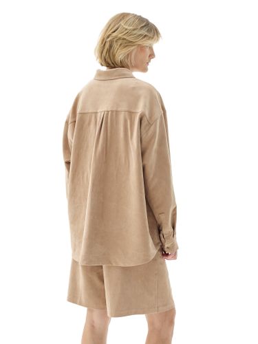 Бежевые шорты из эко-замши