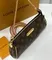 Клатч Louis Vuitton Eva, коричневый