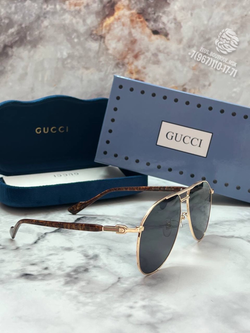 Солнцезащитные очки Gucci