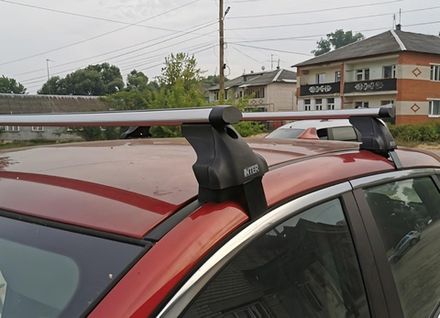 Багажник Интер Спектр на Nissan Almera N16/classik 2000-2012 аэро дуги 120 см.