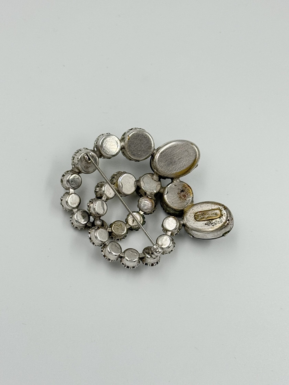 Брошь Schiaparelli