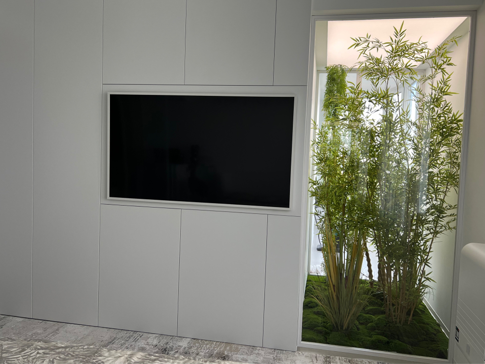 Озеленение искусственными растениями частного интерьера