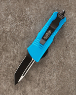 Автоматический складной нож Microtech Mini Troodon Black Tanto 240-1BL (голубой) фронталка/выкидуха