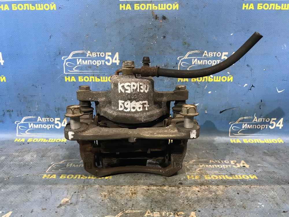 Суппорт тормозной передний правый TOYOTA VITZ 2010-2014