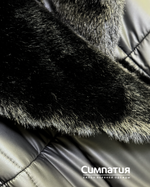 Стильное пальто в черном цвете с декоративными деталями