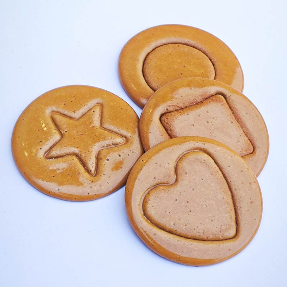 Сахарные соты» (дальгоны) — традиционная южнокорейская сладость, из сериала «Игра в кальмара»