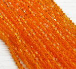 ББ007НН3 Хрустальные бусины "биконус", цвет: оранжевый прозрачный, размер 3 мм, кол-во: 95-100 шт.