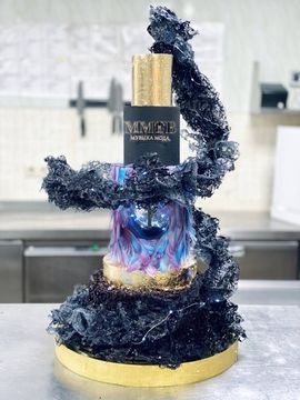 Шоу-торт черный на день рождения телеканала ММТВ