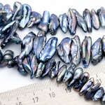 Жемчуг, размер около 12-20*5-8 мм, цена за отрезок 18 см (1/2 нити)