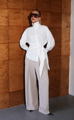 Брюки широкого кроя с защипами