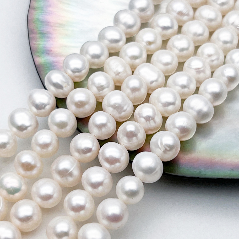 Жемчуг бусины, размер около 6-7,2*5,8-7 мм, цена за отрезок 19 см (1/2 нити)