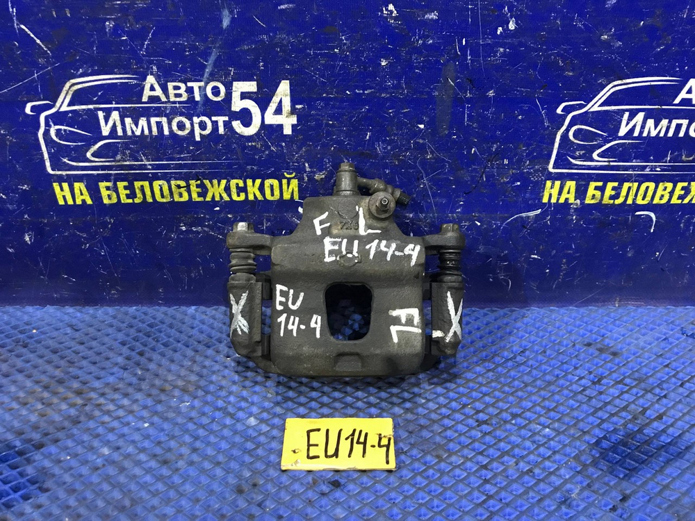 Суппорт тормозной передний левый NISSAN BLUEBIRD 1997