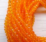 БП007НН23 Хрустальные бусины "рондель", цвет: оранжевый прозрачный, 2х3 мм, кол-во: 95-100 шт.