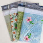 Скатерть ПЕРСПЕКТИВА обраб.винил.кружевом 135*160 неткан.основа с ПВХ Микс расцветок