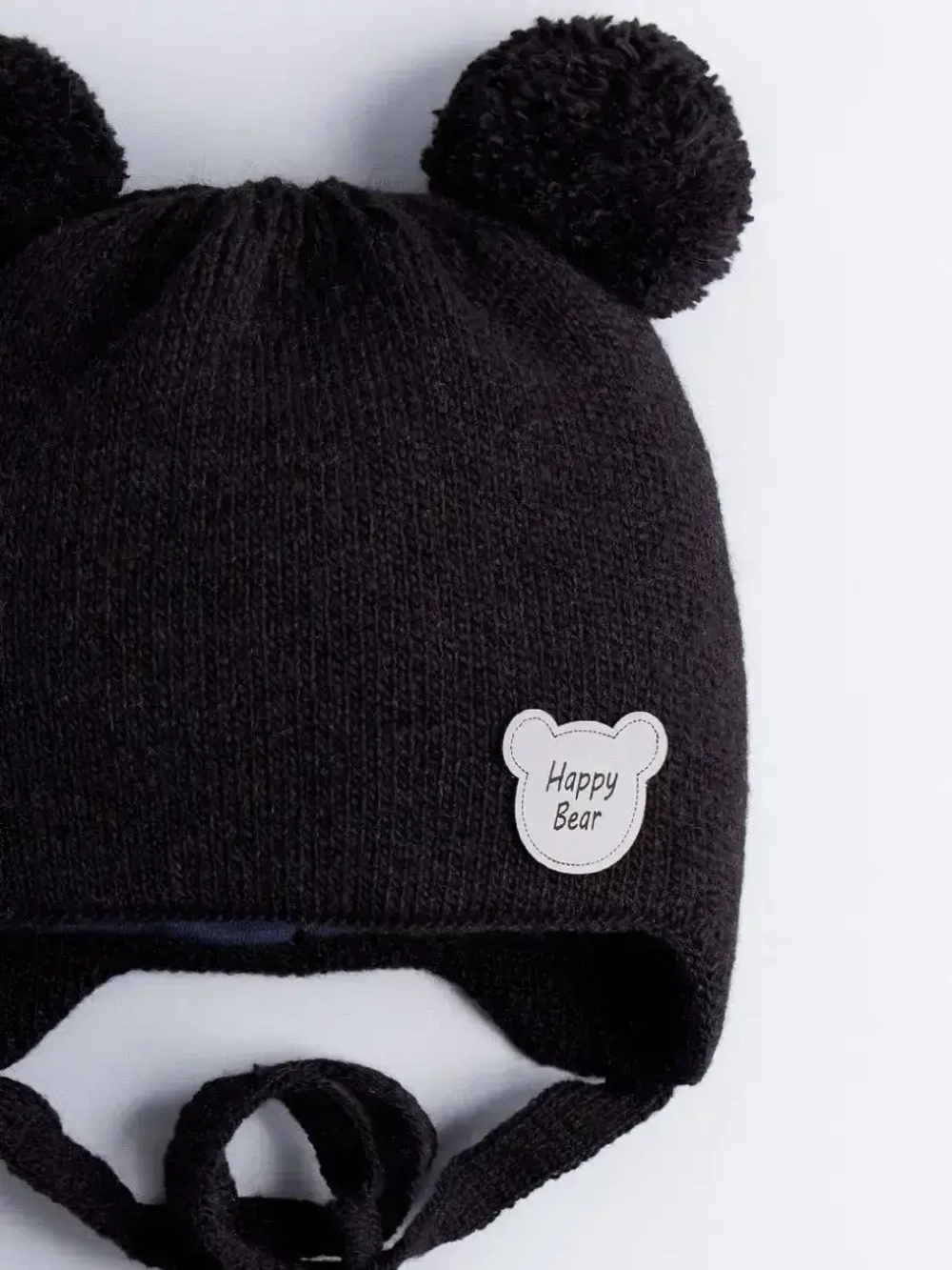 Шапка детская осенняя с завязками и помпонами