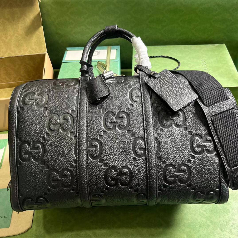 Средняя дорожная сумка Gucci Jumbo GG