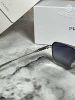 Солнечные очки Prada