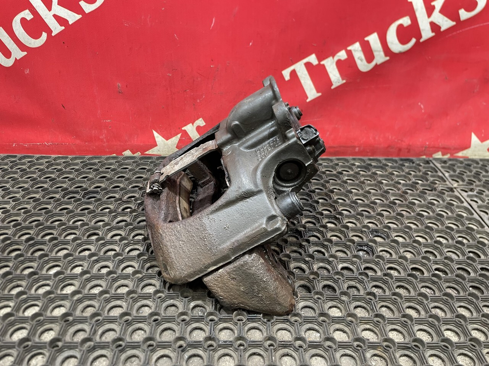 Суппорт задний левый