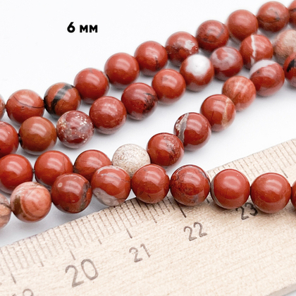 Яшма красная бусины, диаметр около 6,1-6,2 мм, цена за 30-31 шт (1/2 нити)