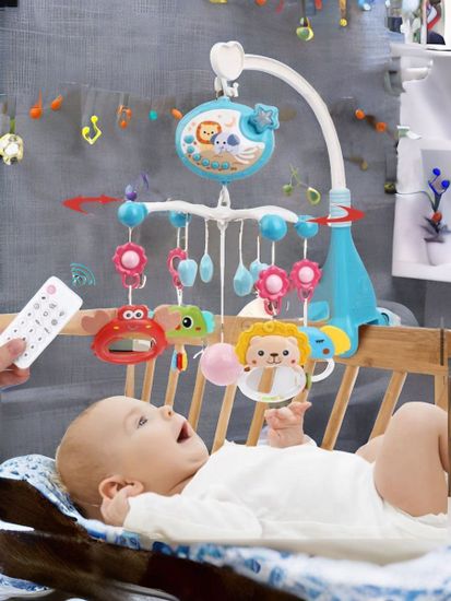 Музыкальный мобиль на кроватку для новорожденных с проектором  ( голубой )