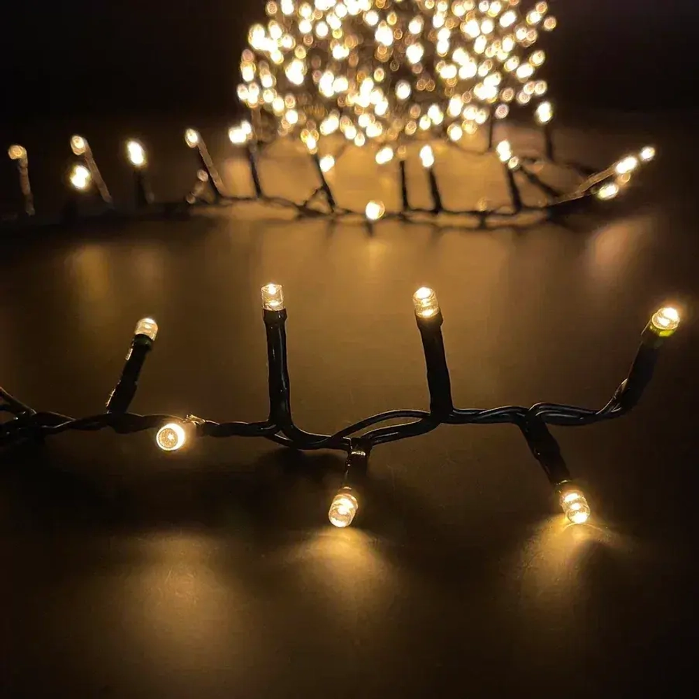 Светодиодная нить Snake Light 2000 теплых ламп, 40 м., 24В, 8 режимов, зеленый провод, для елки 260-300 см., Christmas DeLuxe (85745)