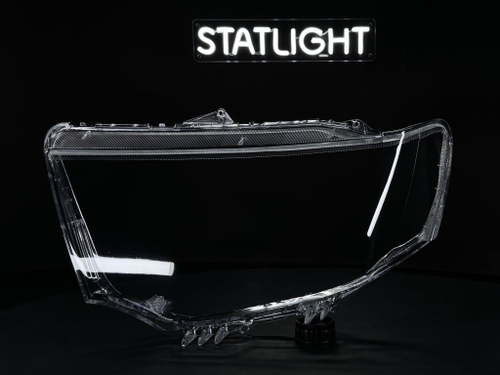 Левое стекло фары Mitsubishi Pajero Sport 2008-2016