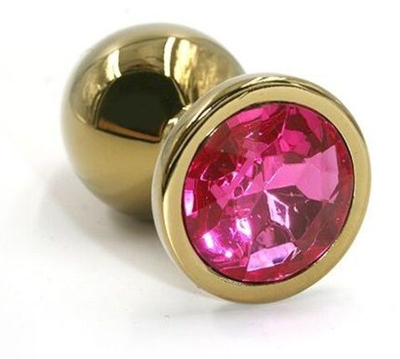 Золотистая алюминиевая анальная пробка с ярко-розовым кристаллом - 7 см. (Цвет: розовый)