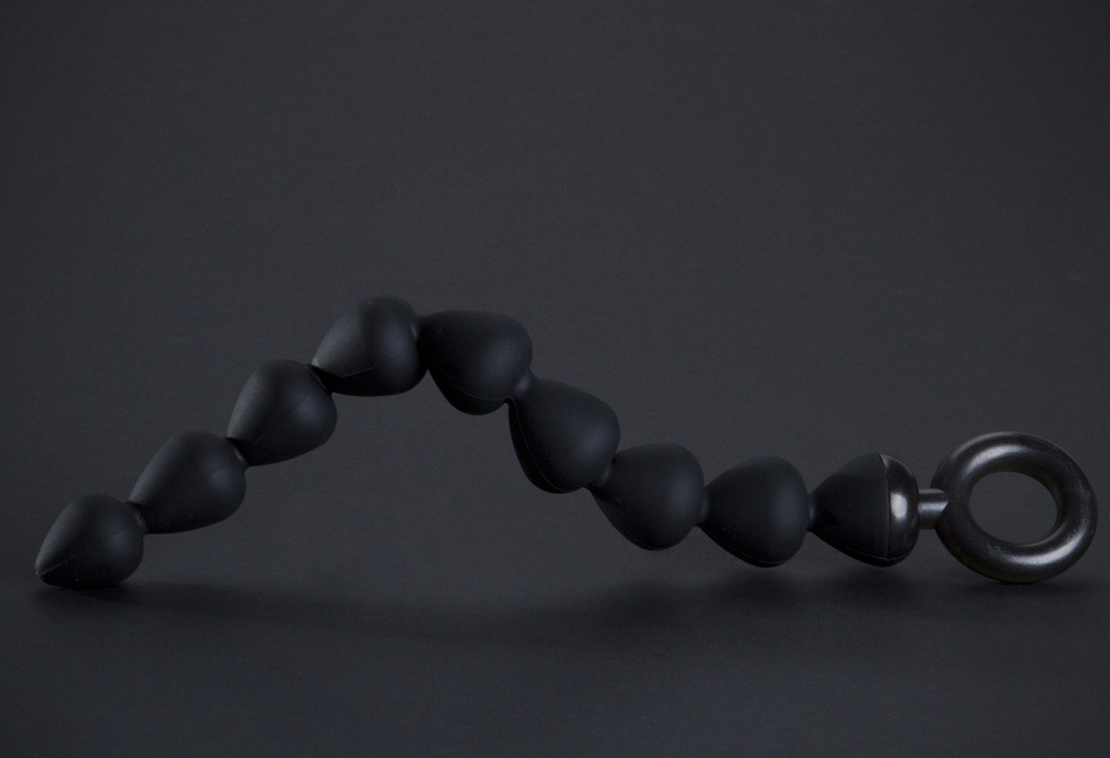 Чёрная анальная цепочка с 9 звеньями - 25 см.