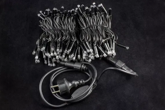 Светодиодная нить с мерцающим диодом 20 м., 220V, 200 теплых белых LED ламп, черный каучук, соединяемая, Winner Light (ww.01.7B.200+)