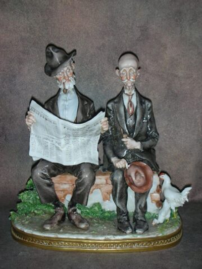 Статуэтка. Фарфор. Утренние новости. Capodimonte. Италия