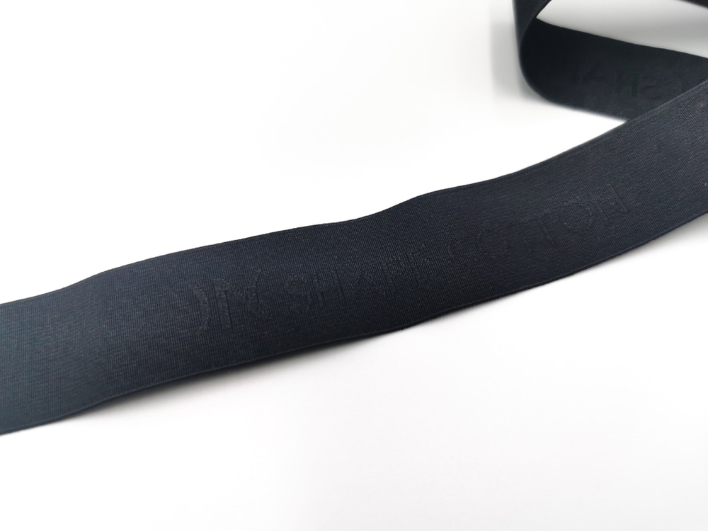 Отделочная резинка (Германия), 25 мм, черная с надписью "Shape cotton" (Арт: OTR26B-170), м