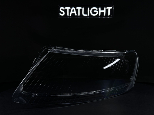 Левое стекло фары AUDI A6 С6 2004-2011